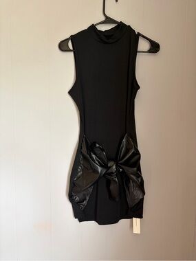 Commense Sleeveless Black Dress with Statement Bow -